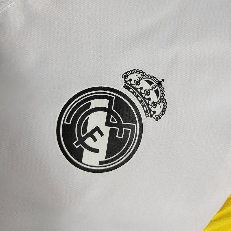 Jaqueta Corta-Vento Real Madrid 23/24 Masculino Adidas - Branco Azul Amarelo
