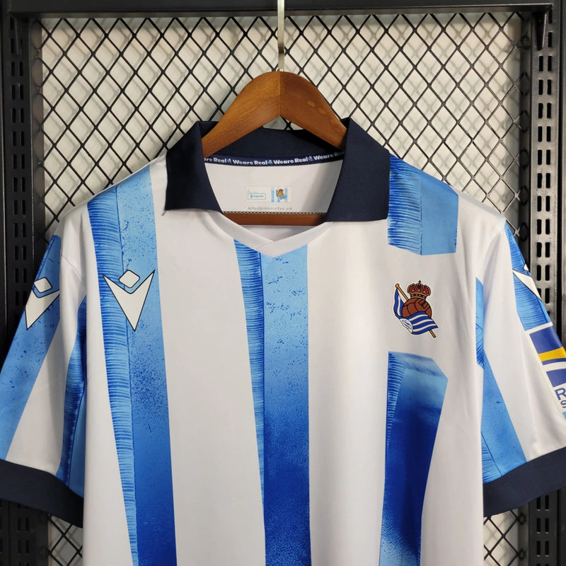 Camisa Real Sociedad - 22/23 Torcedor Masculino Azul e Branco