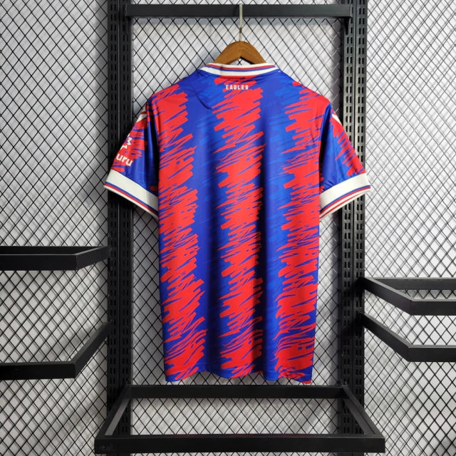 Camisa Crystal Palace Macron 22/23 Masculino Vermelho e Azul