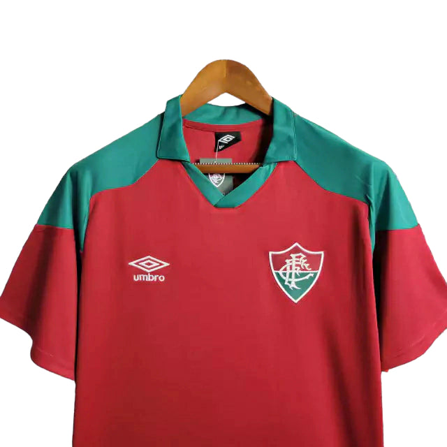 Camisa Fluminense Treino I 23/24 Umbro Torcedor Masculina - Vermelha com detalhes em verde